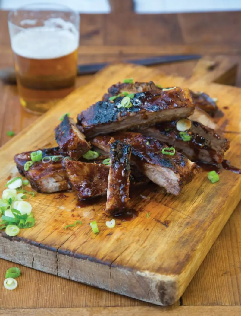 asian baby back ribs on a cutting board