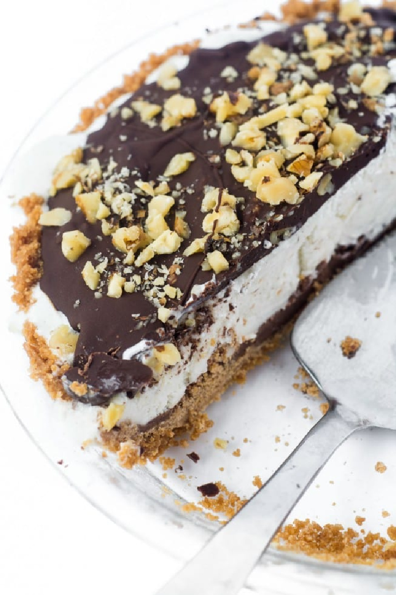 drumstick ice cream pie with a slice taken out of it