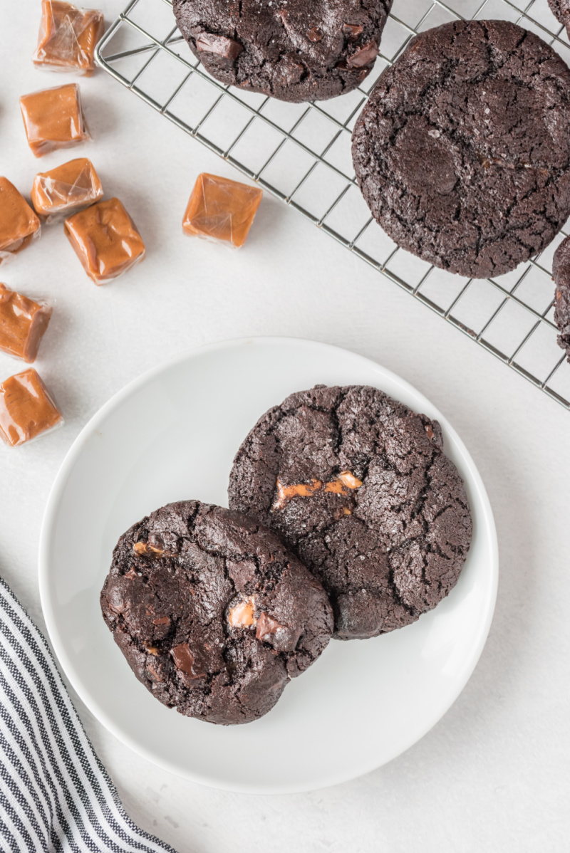 chocolate caramel cookies on a white plate