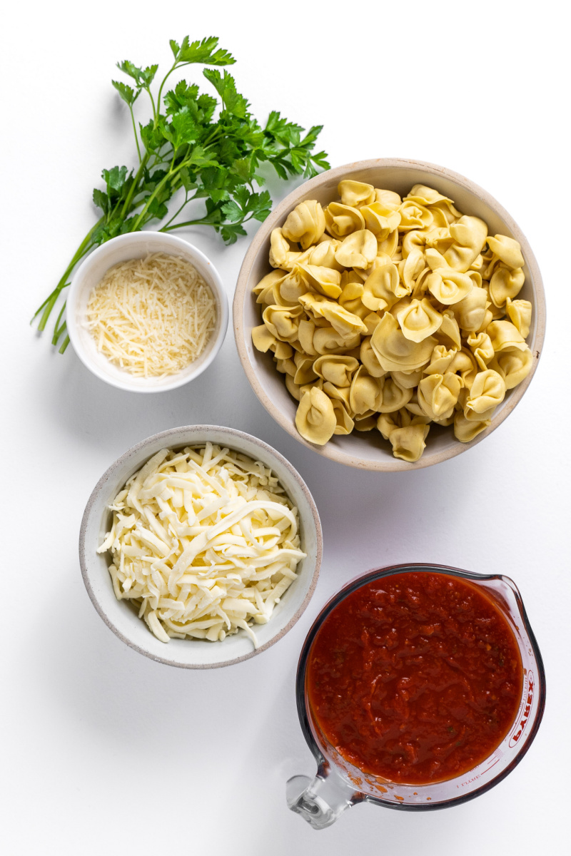 ingredients displayed for making baked tortellini casserole