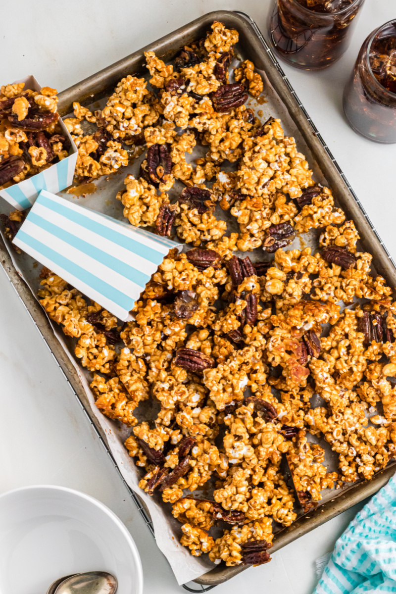 sticky bun popcorn on a baking sheet