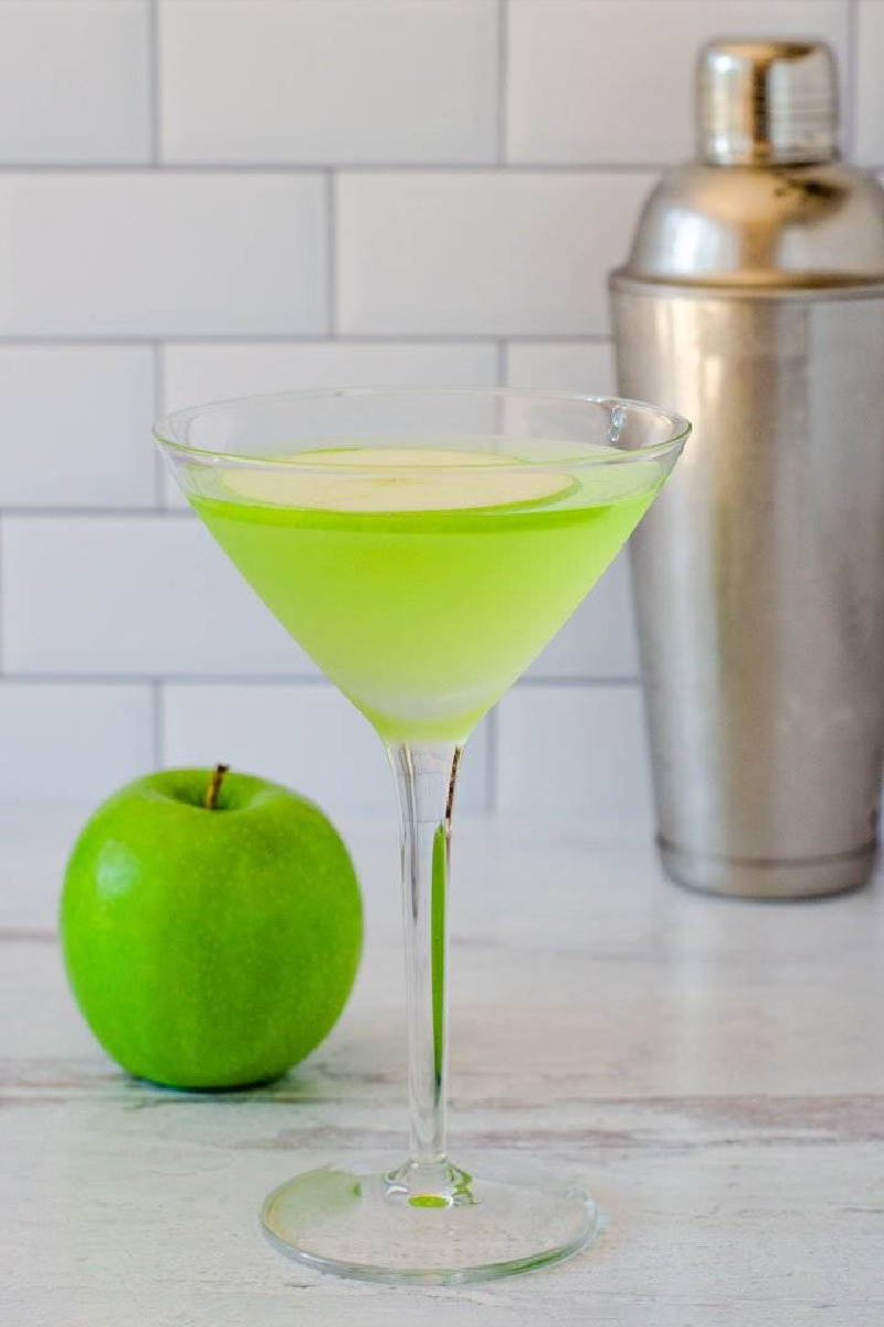green apple martini with a green apple