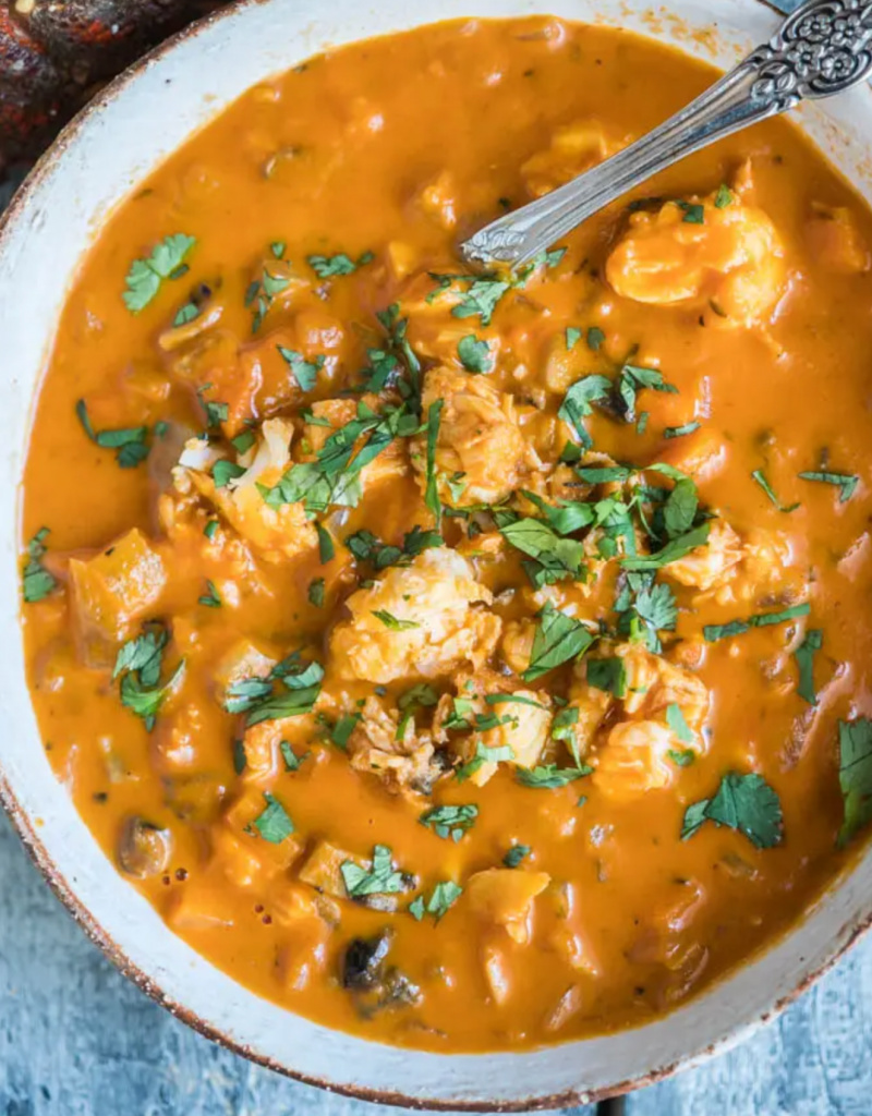 lobster bisque in bowl with spoon