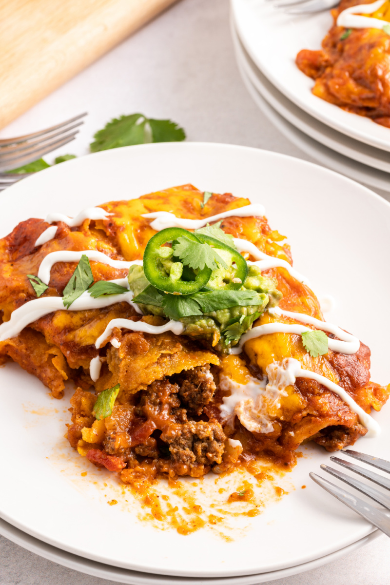 beef enchiladas on a white plate