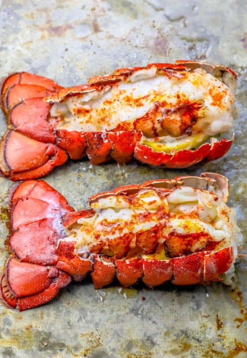 two broiled lobster tails