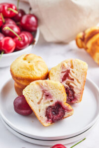 cherry popovers on a plate one cut open