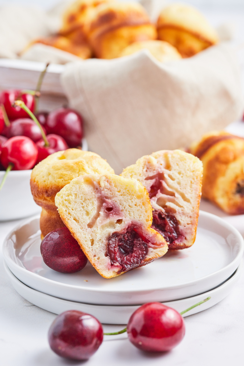 cherry popovers on a plate one cut open