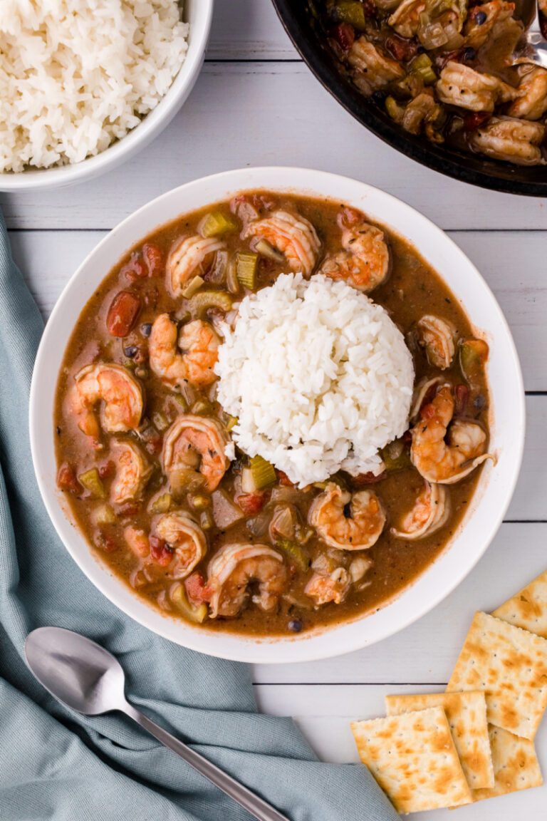 shrimp gumbo in a bowl topped with rice