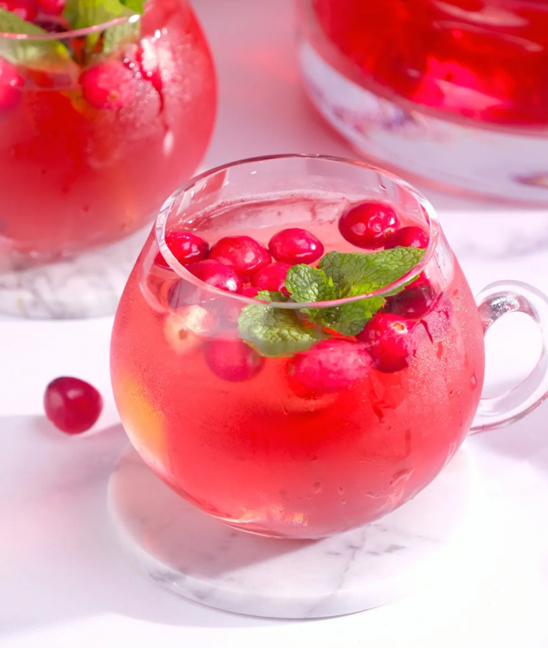 glass of cranberry champagne party punch