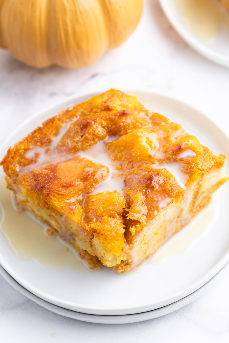 slice of pumpkin bread pudding on a plate