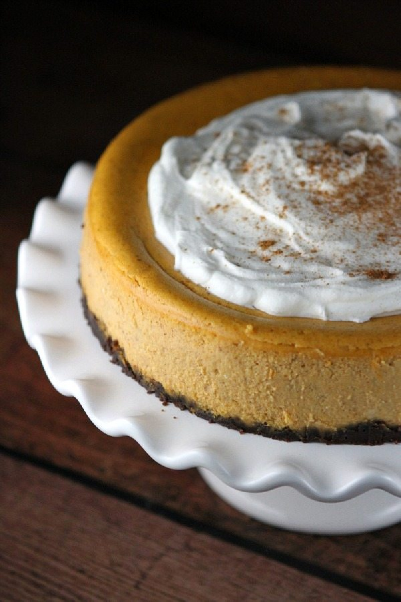 pumpkin cheesecake on white platter