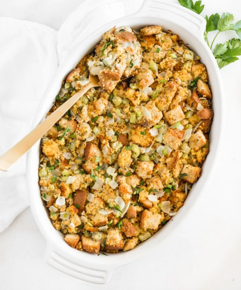 stuffing in white oval dish with spoon