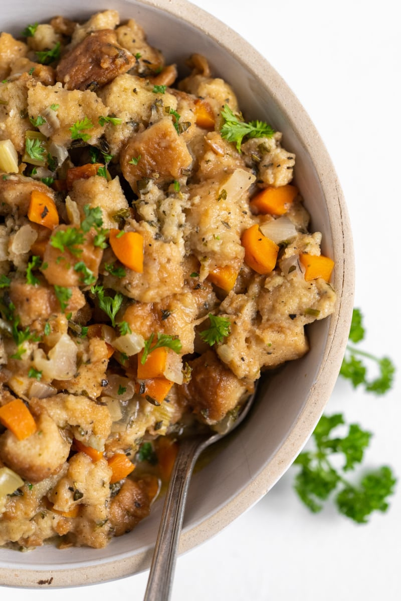 bowl of stuffing with a spoon