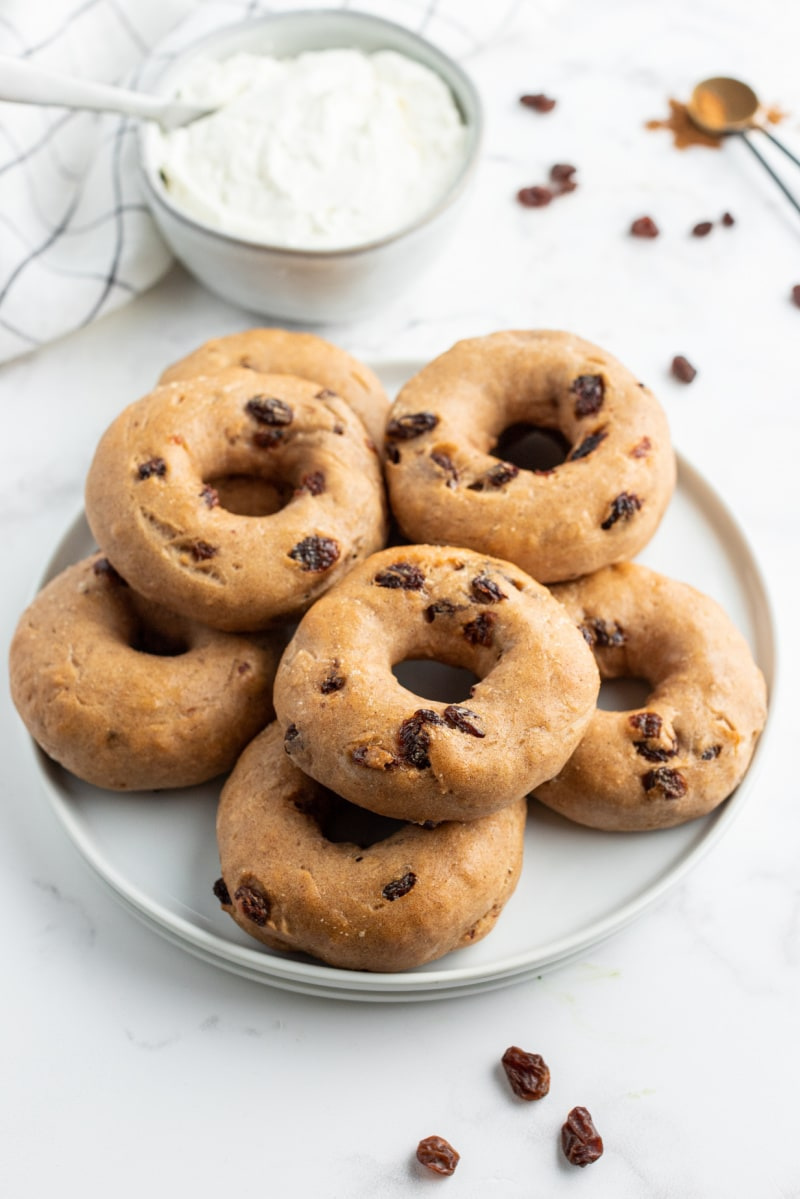 several cinnamon raisin bagels on plate