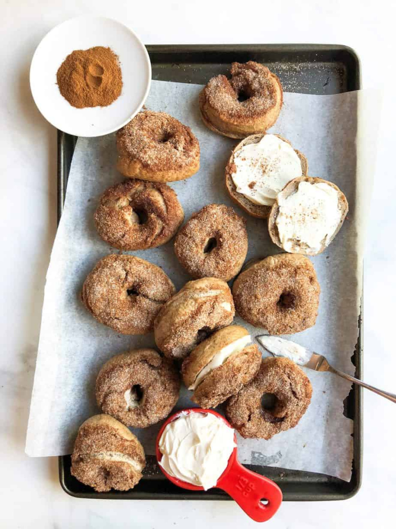 several cinnamon sugar crunch bagels on tray