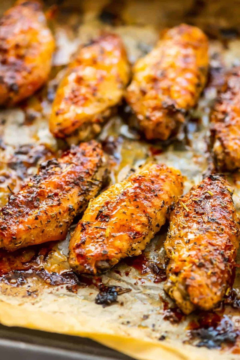 garlic and herb baked chicken wings on baking sheet