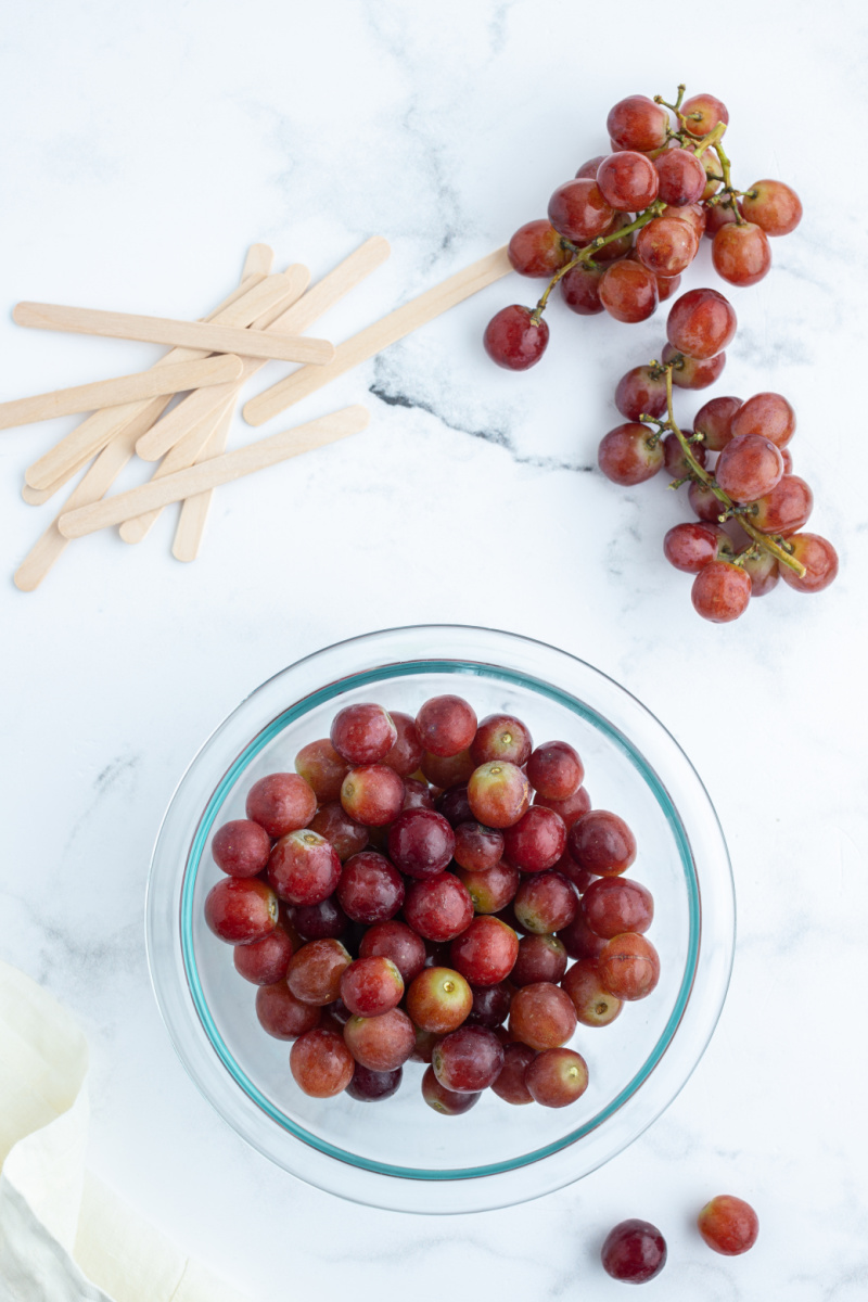 ingredients displayed for making grape popsicles