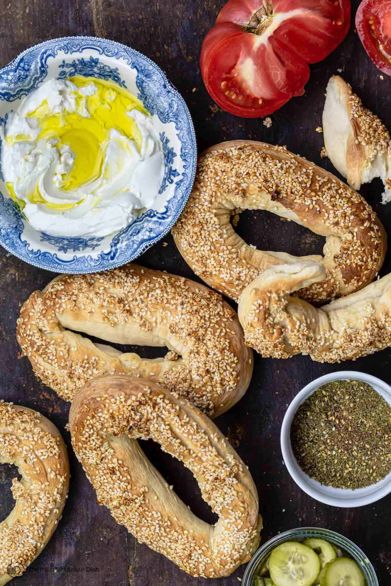 several jerusalem bagels with dip