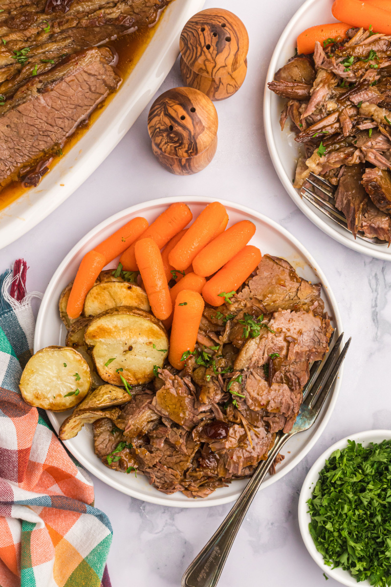 plate of brisket, potato and carrots
