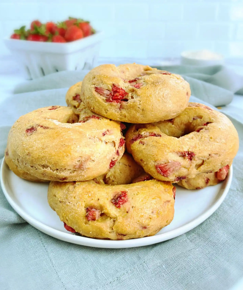 plate of four strawberry bagels