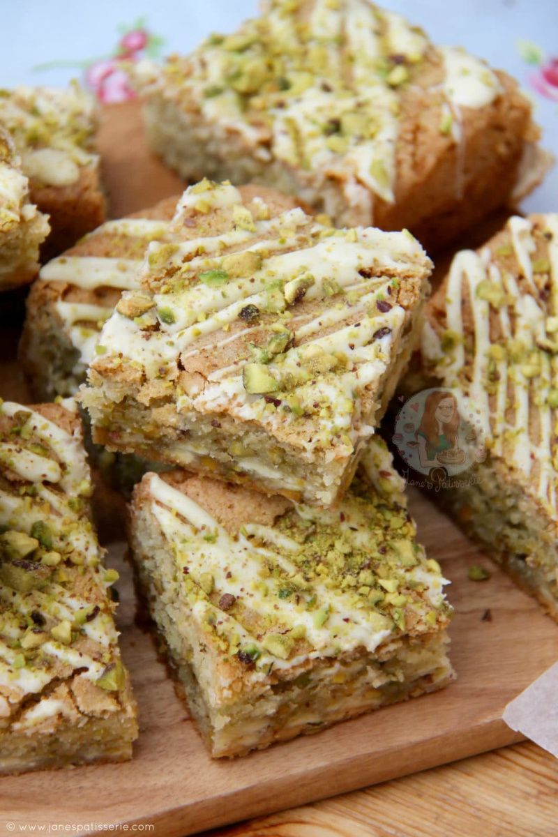 white chocolate pistachio blondies displayed on board