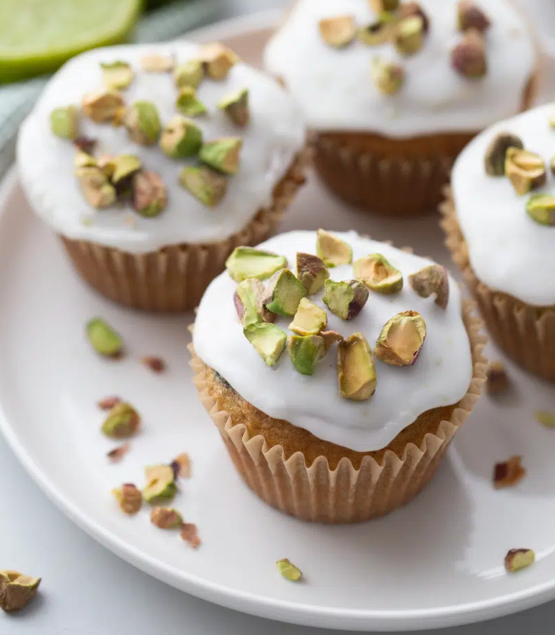 zucchini pistachio cupcakes on a plate