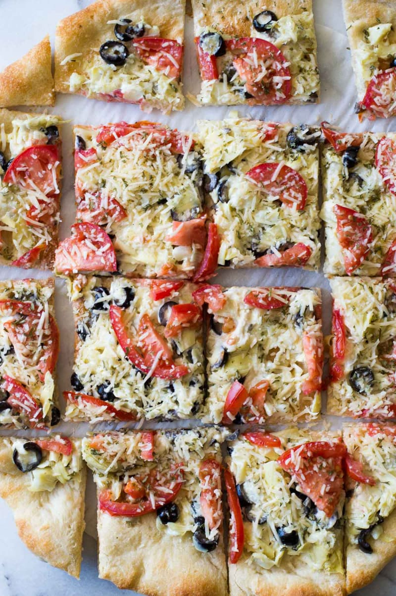 easy artichoke pizza bites cut into slices