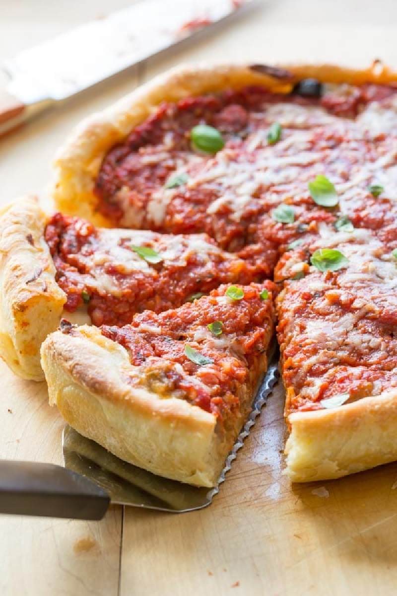 chicago style deep dish pizza sliced 