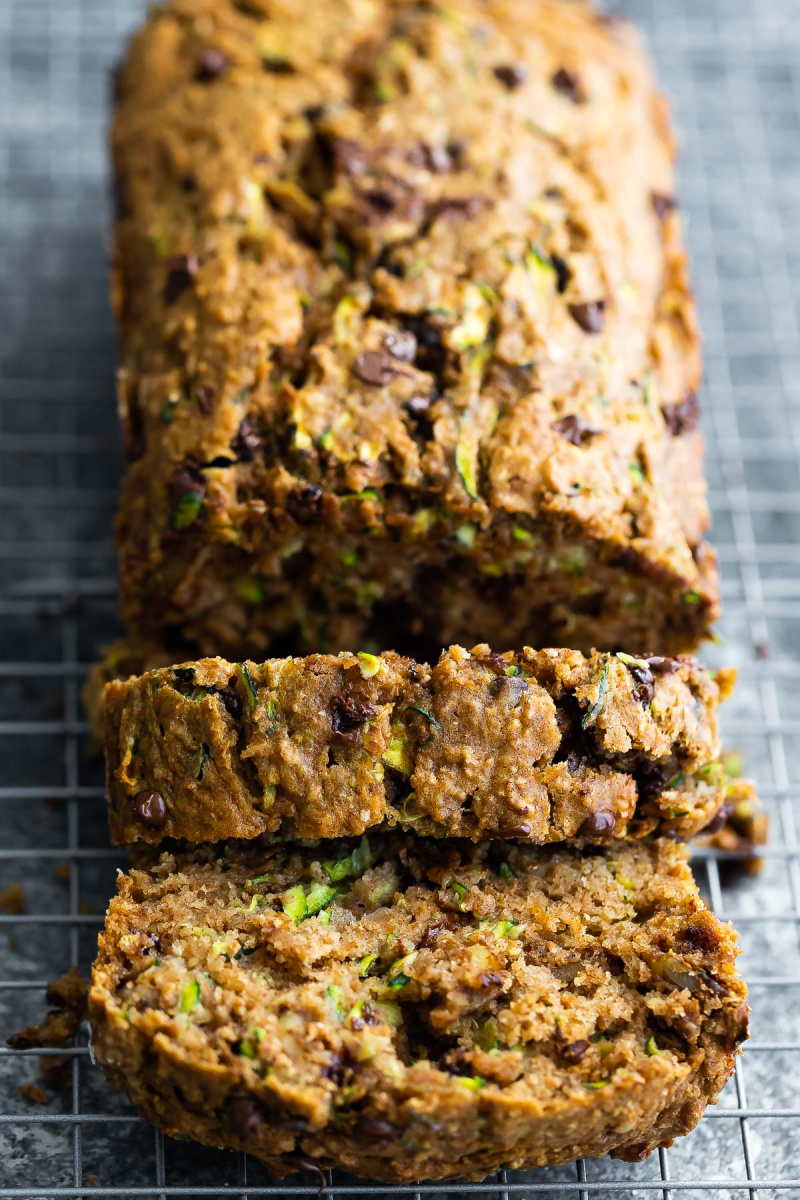 loaf of healthy zucchini bread with a few slices