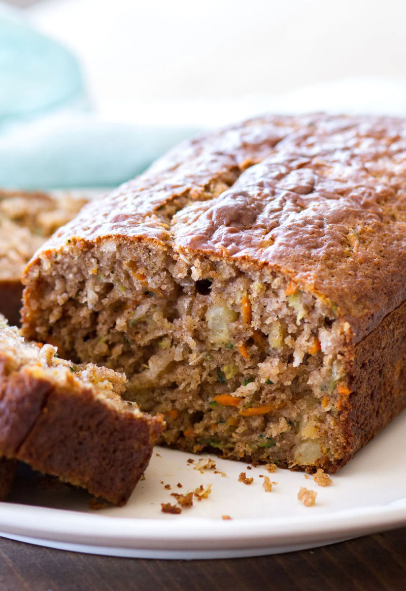 loaf of pineapple carrot zucchini bread sliced open