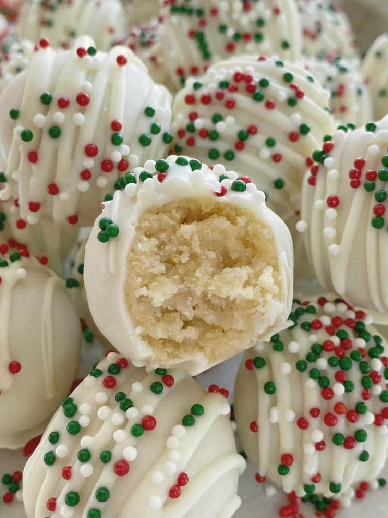 sugar cookie truffles with one bitten into