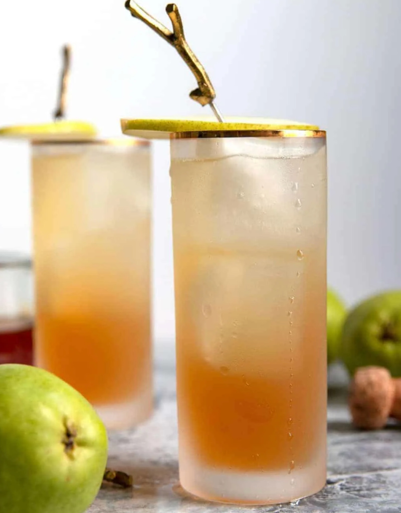 two sparkling bourbon pear cocktails