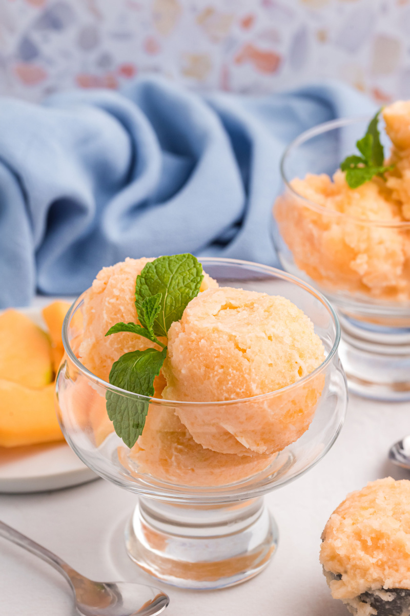 scoops of melon sorbet in a glass