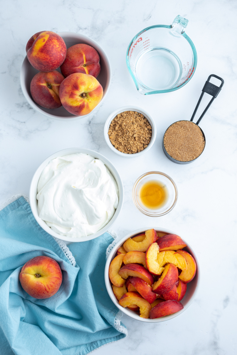 ingredients displayed for making peaches and cream parfaits