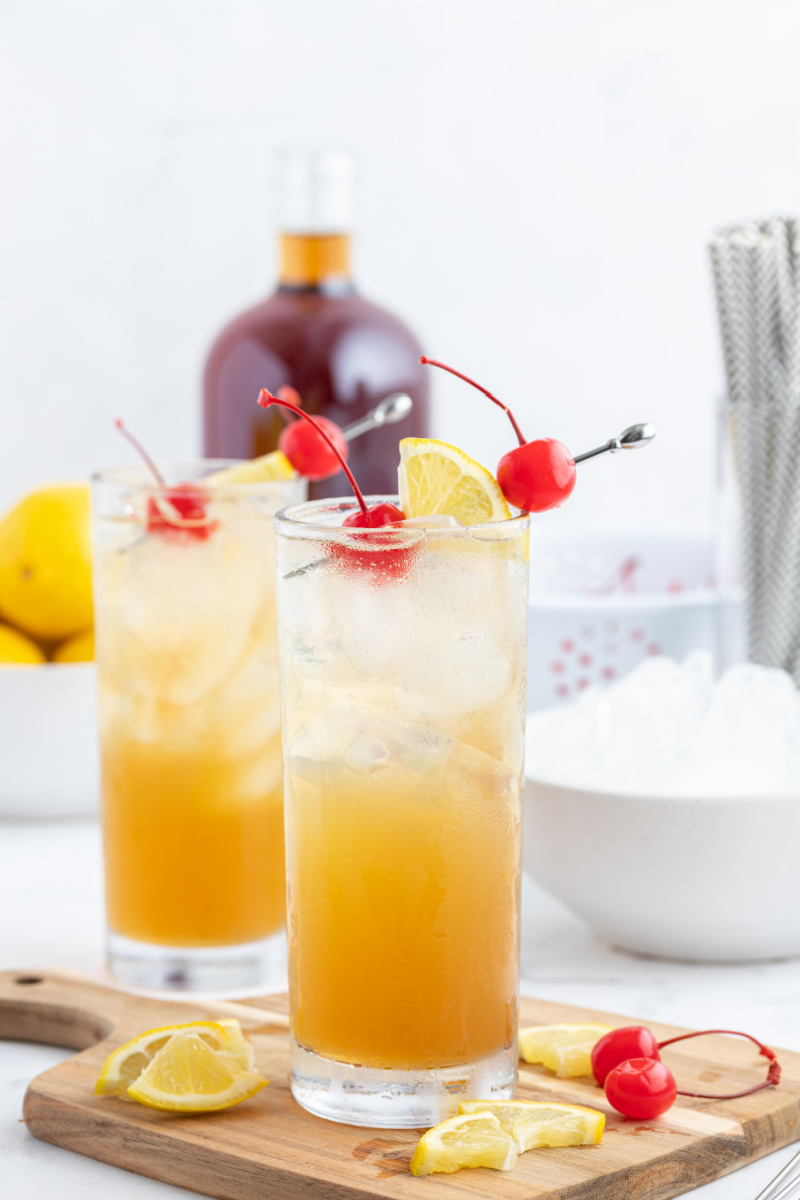 whiskey sour punch in two glasses