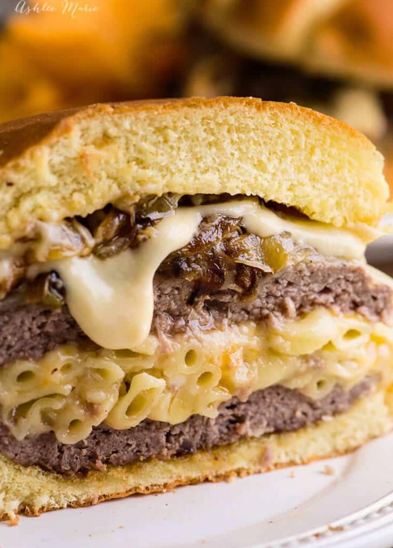 mac and cheese stuffed cheeseburger sliced in half to see inside