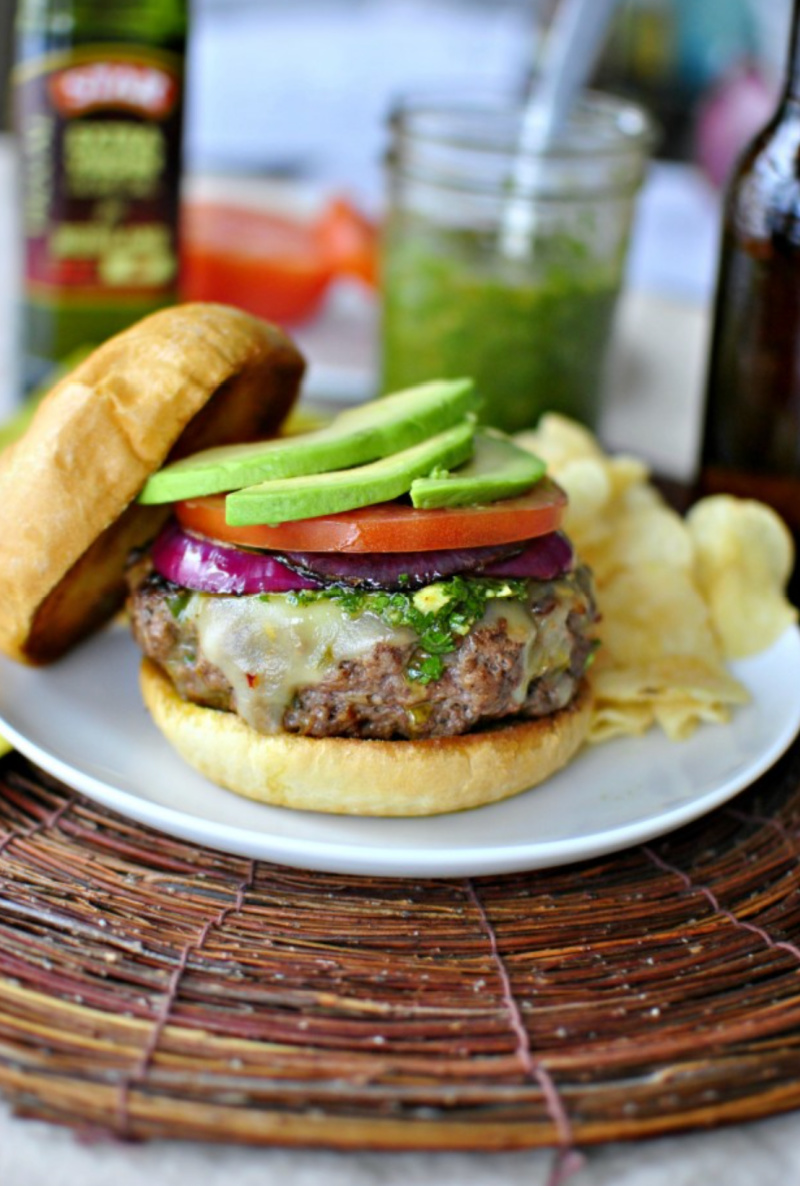 spicy chimichurri burger on a plate open faced