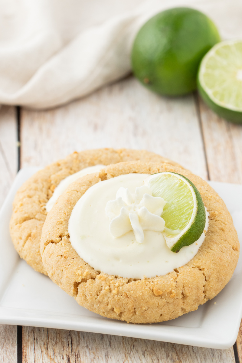 two key lime pie cookies on a plate