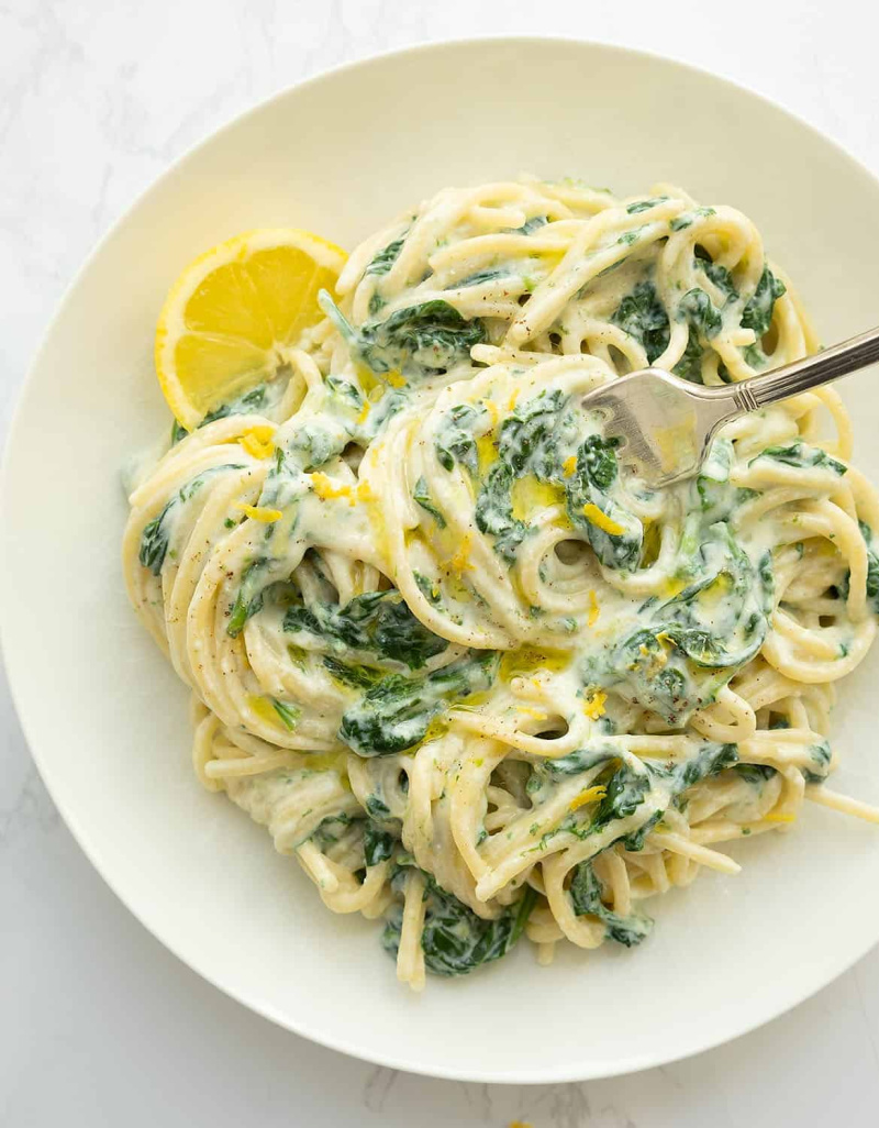 bowl of lemon ricotta pasta with spinach