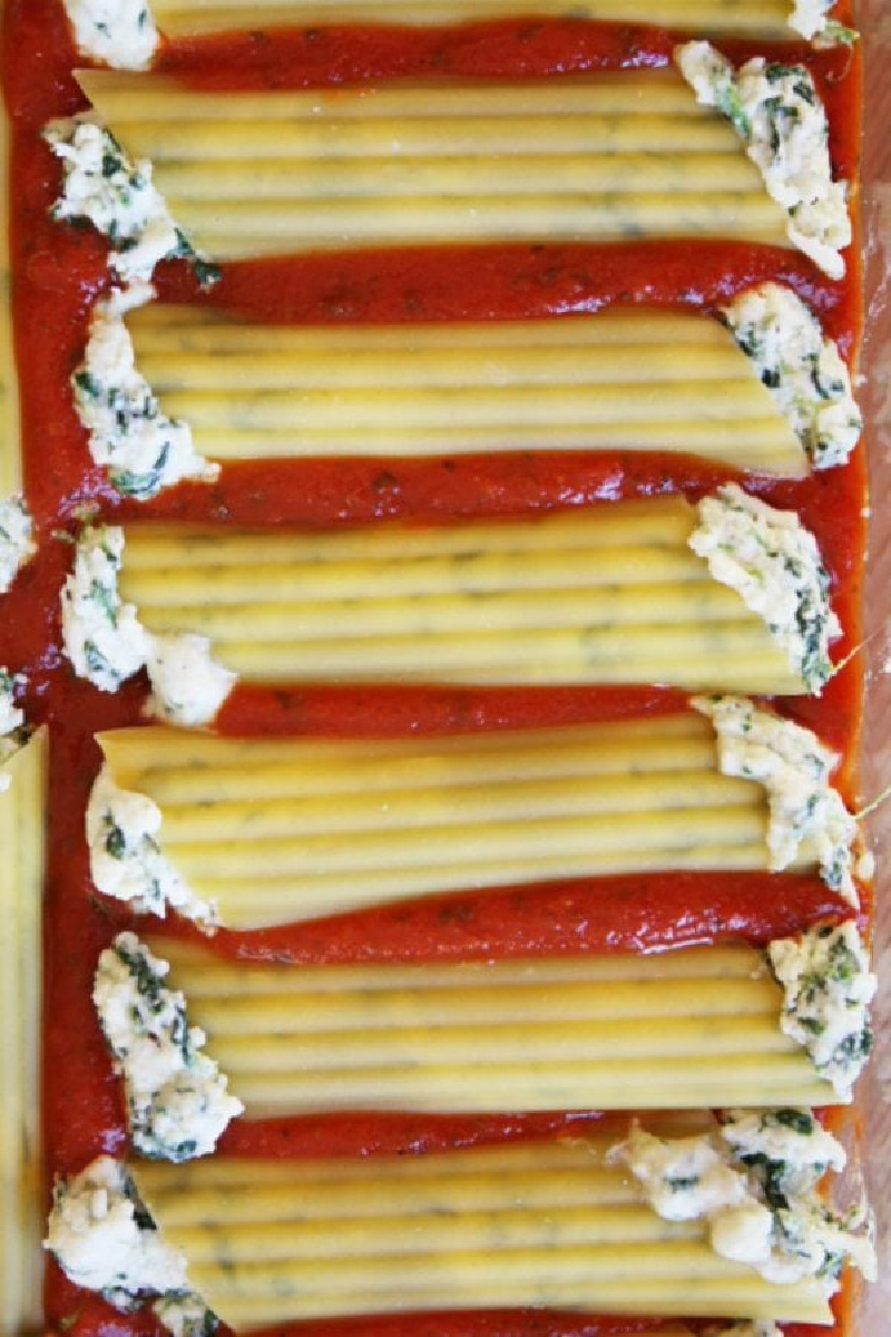 pan of spinach and cheese stuffed manicotti