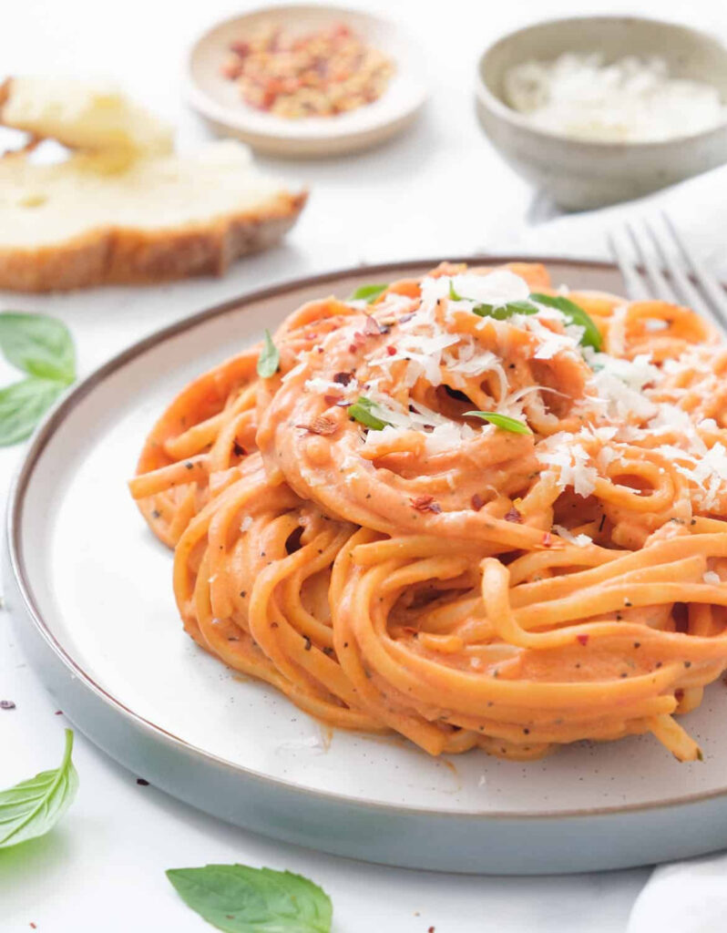 plate of tomato pasta with cream cheese