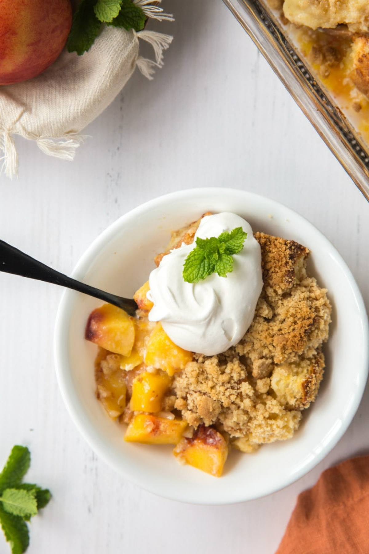peach cobbler french toast casserole in bowl