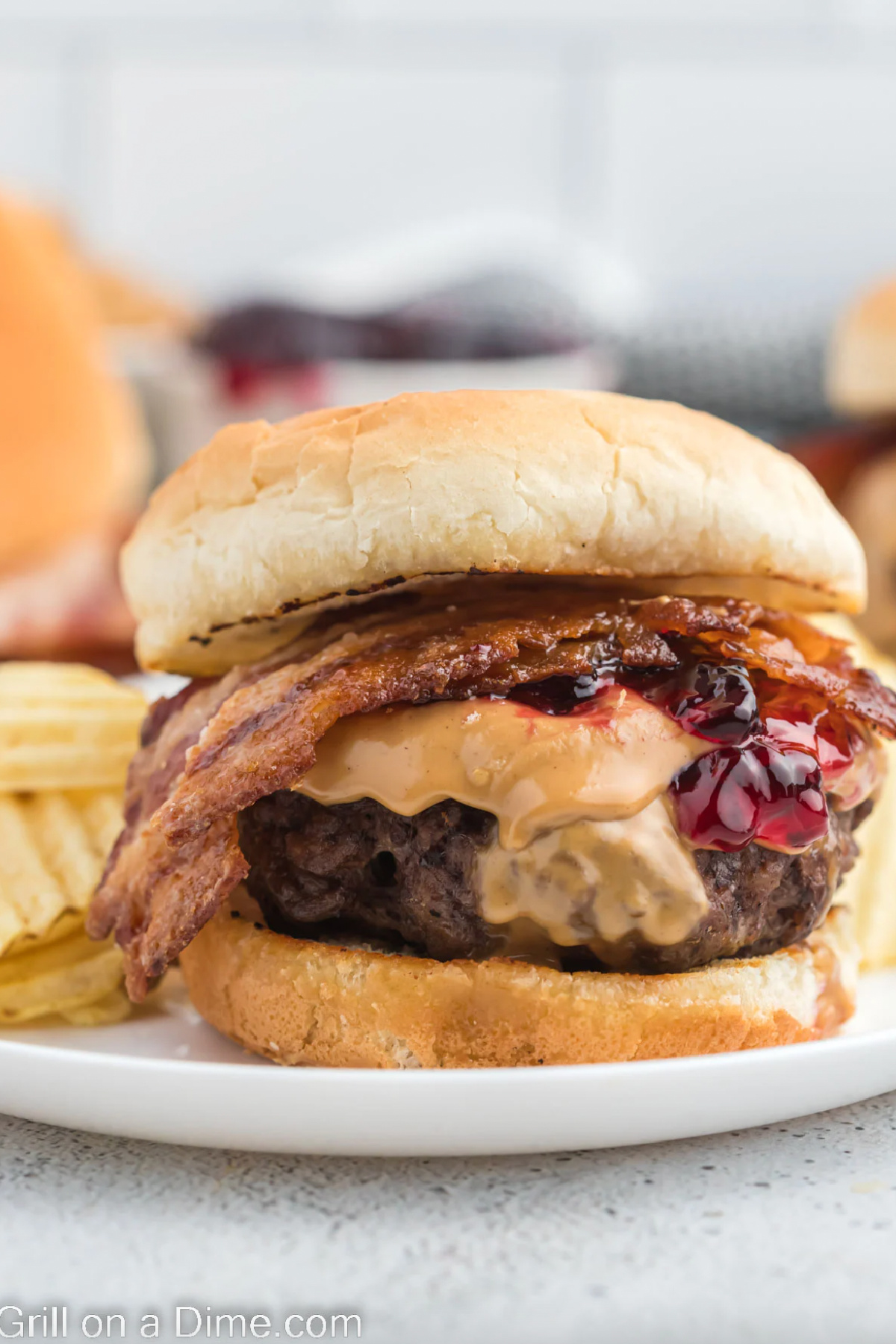 peanut butter and jelly burger on a plate