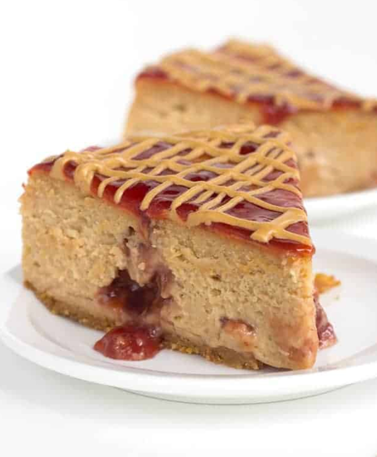 slice of peanut butter and jelly cheesecake on plate