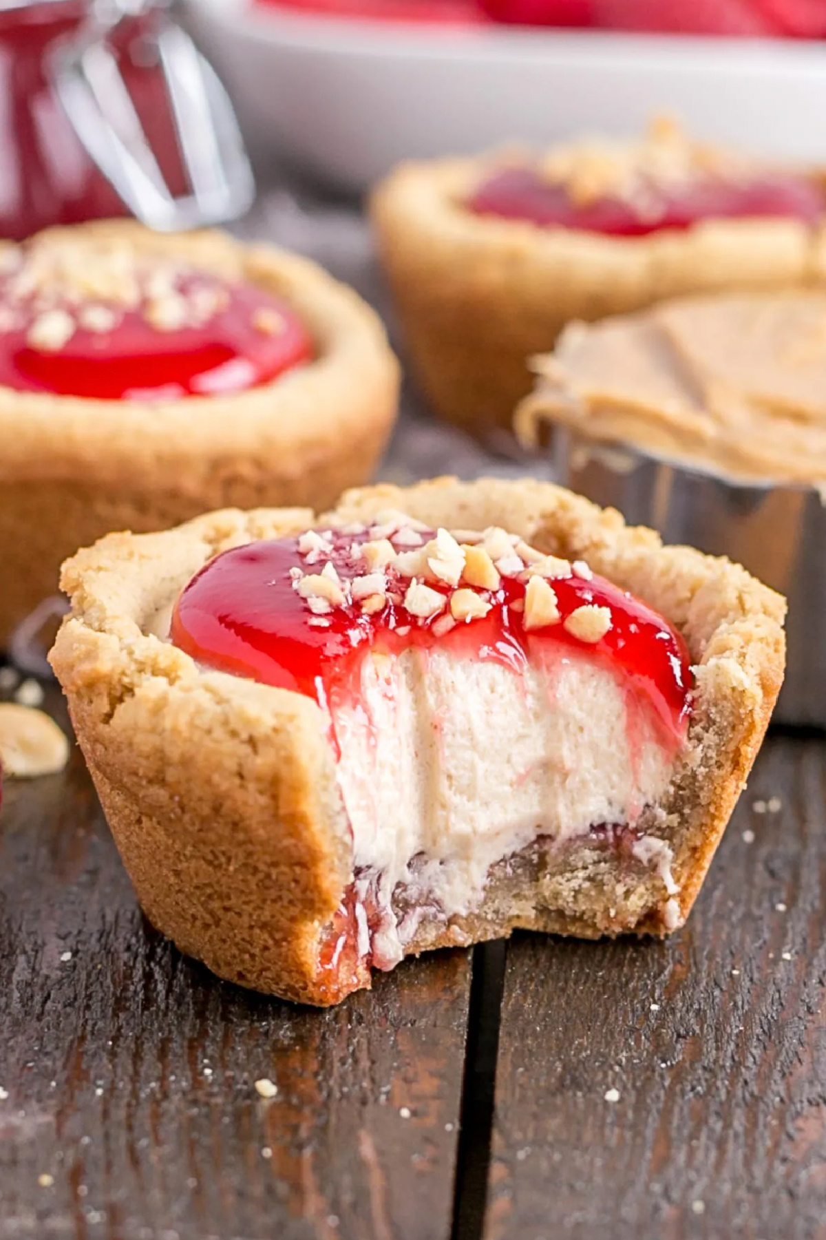peanut butter and jelly cookie cups one with bite taken out