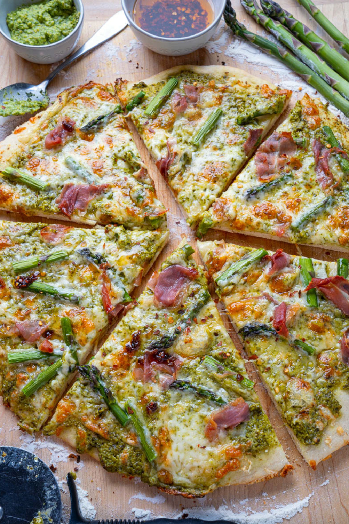 asparagus pizza cut into slices