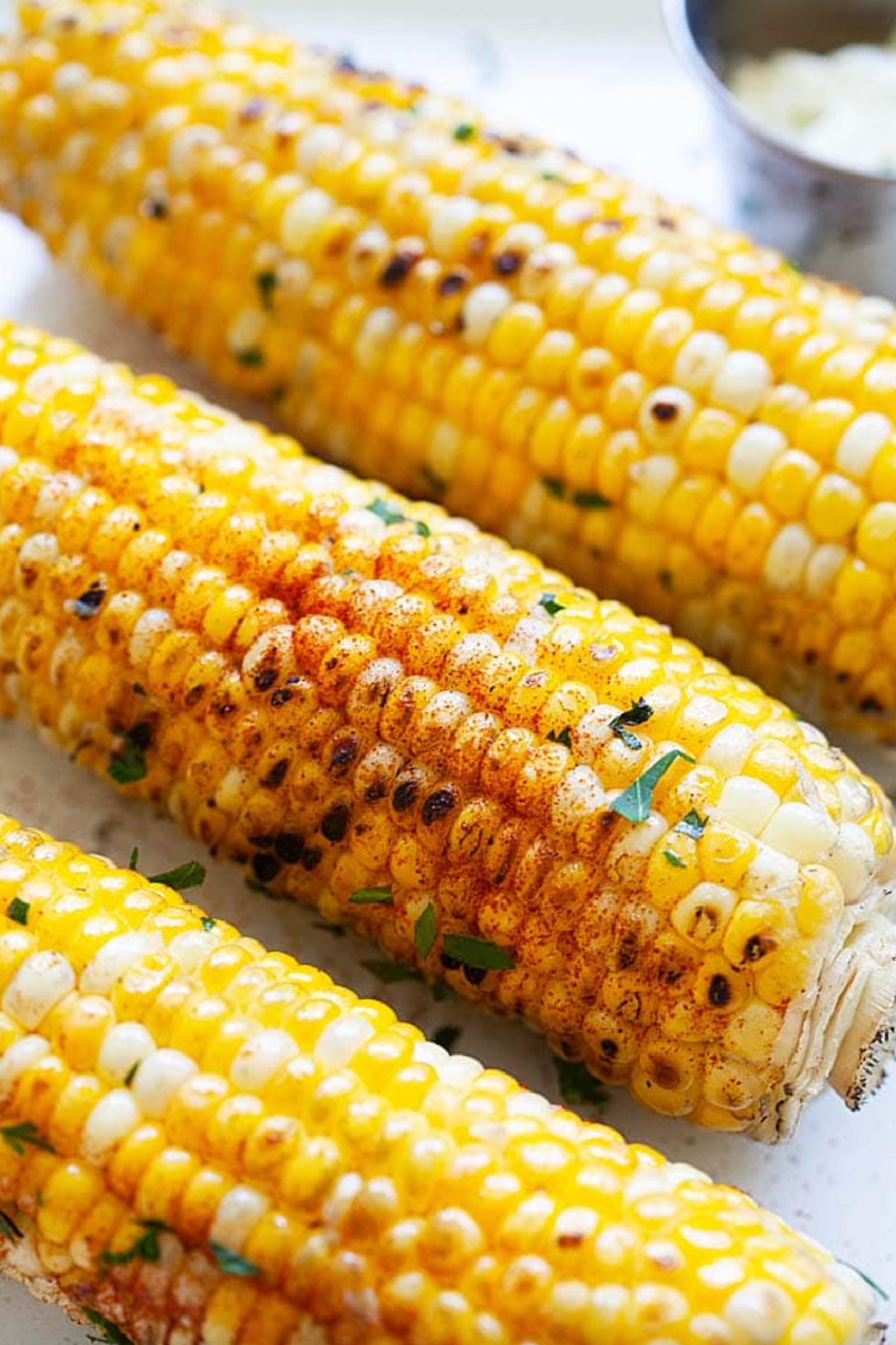 three garlic butter grilled corn