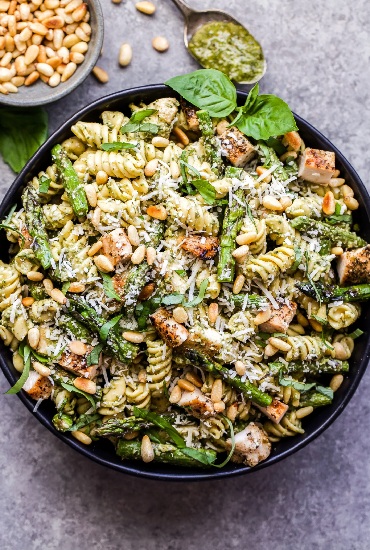 pan of grilled chicken and asparagus pesto pasta
