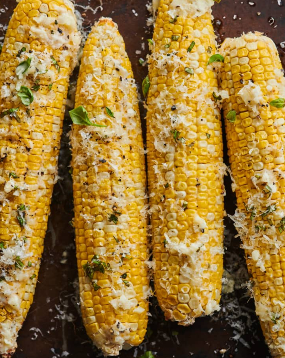 several oven roasted parmesan corn