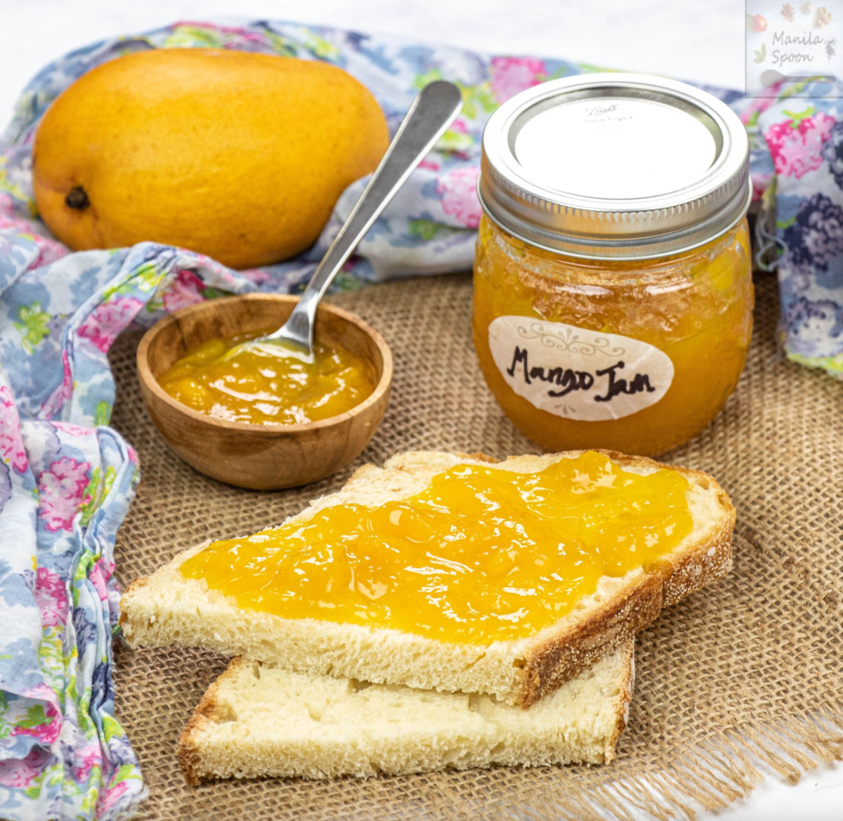 3 ingredient mango jam on board spread on toast too